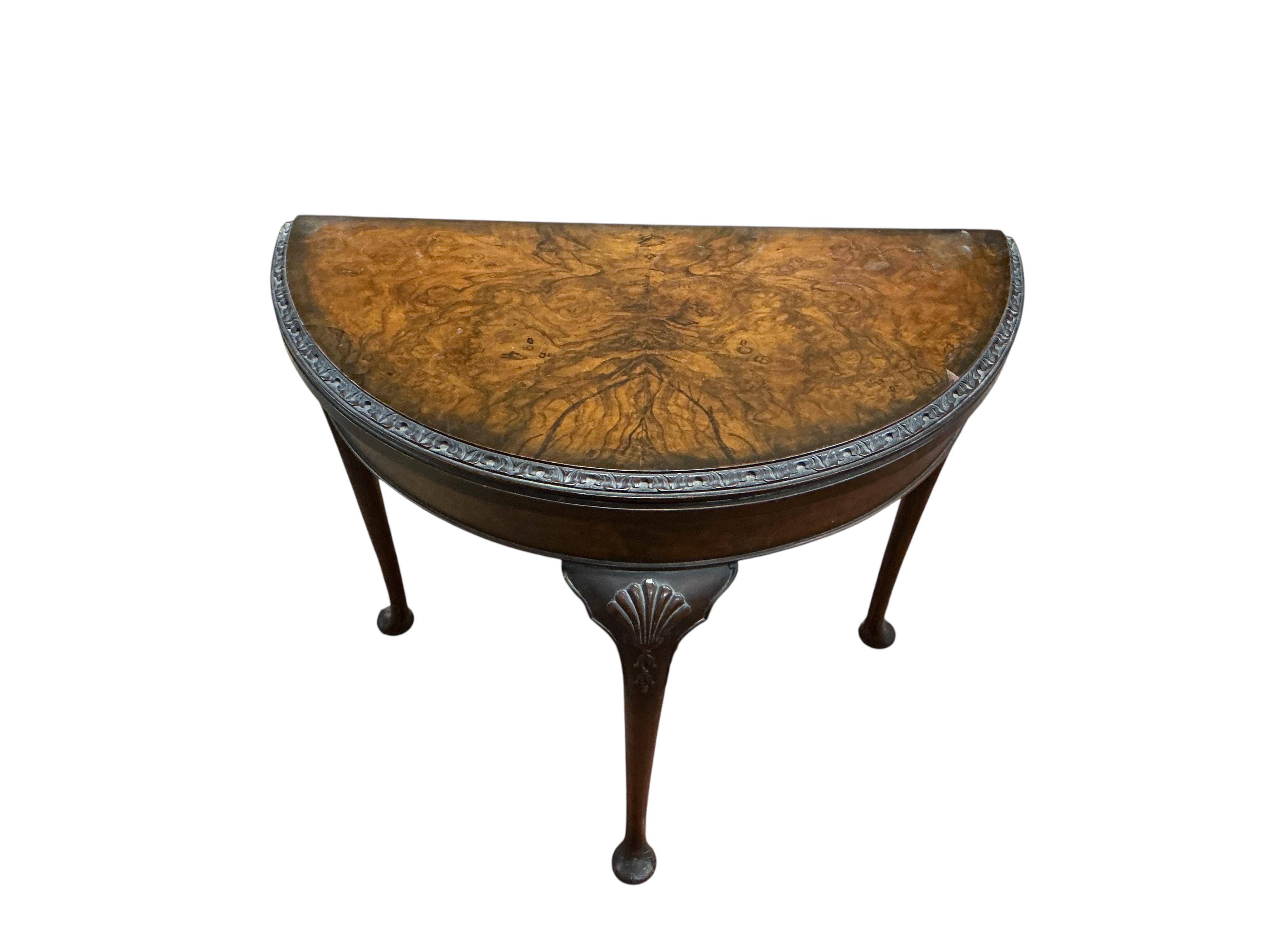 A Queen Anne Revival walnut demi lune folding card table, width 80cm, depth 42cm, height 74cm